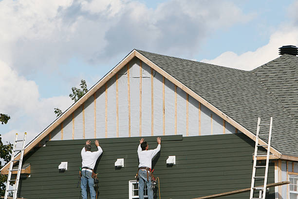 Professional Siding Installation technician working in Madison, OH